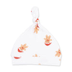 Knotted baby hat in ribbed modal with a gingerbread man print and top knot detail