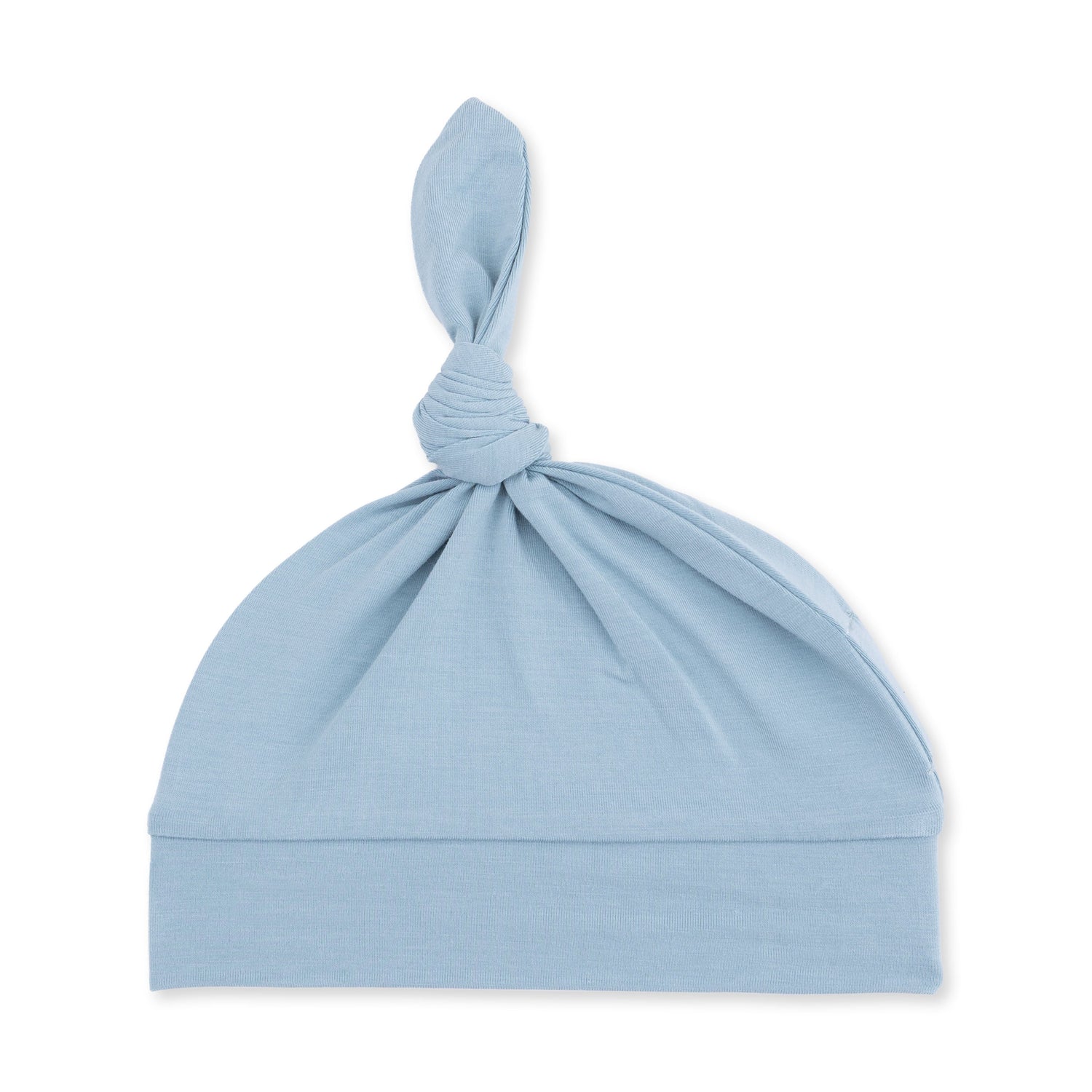 Knotted baby hat in solid stone blue with a tied top knot detail