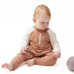Raglan sweatshirt with football laces applique and matching joggers set for a baby.