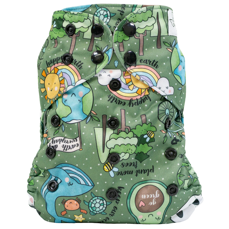 Slim Fit AIO Cloth Diaper with colorful nature print and snap closures on green background.