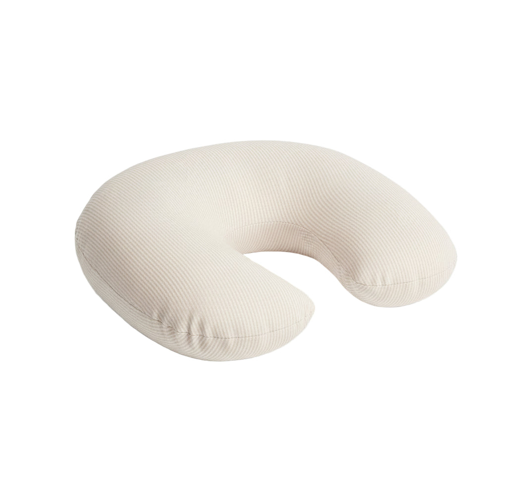 Close-up of a soft, organic coco waffle knit nursing pillow cover from Little Mae & Co, ready for comfort.