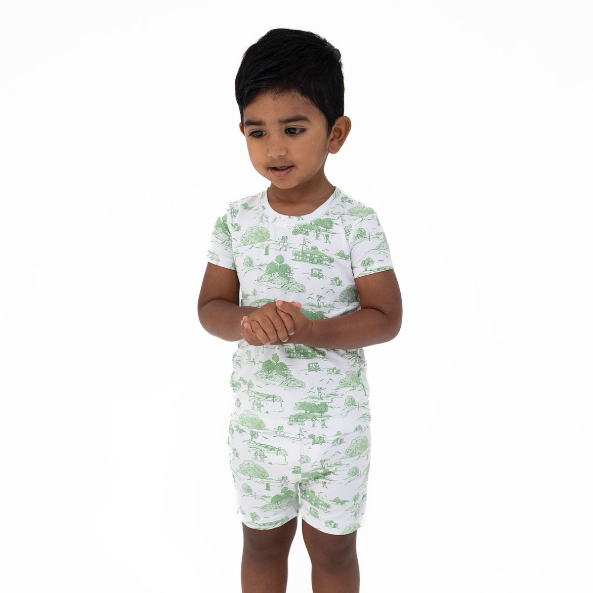 Two-piece loungewear short set in green golf toile print, matching top and pull-on shorts