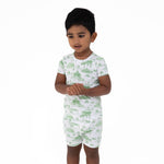 Two-piece loungewear short set in green golf toile print, matching top and pull-on shorts