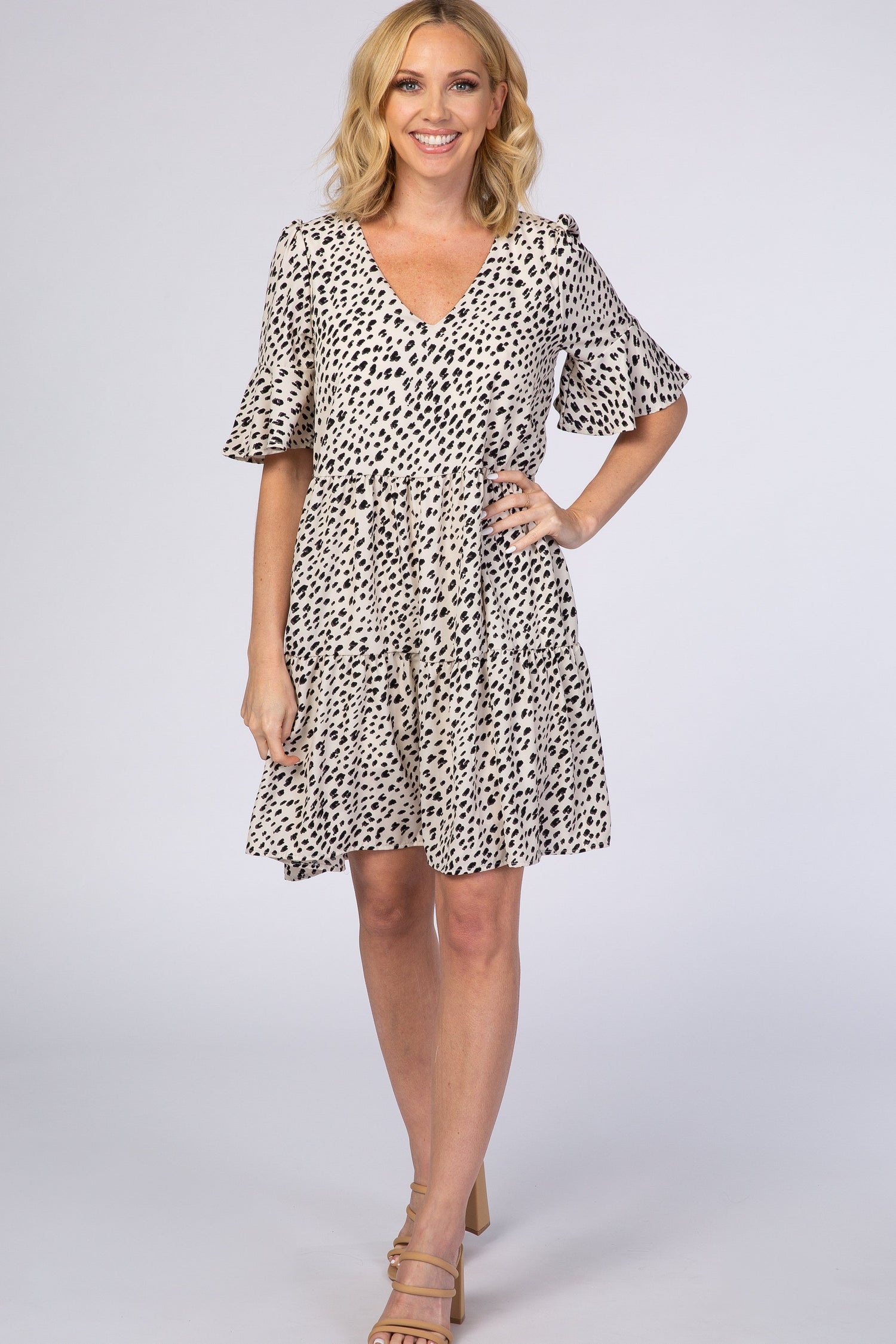 Animal print short sleeve dress with ruffle sleeves and v-neckline