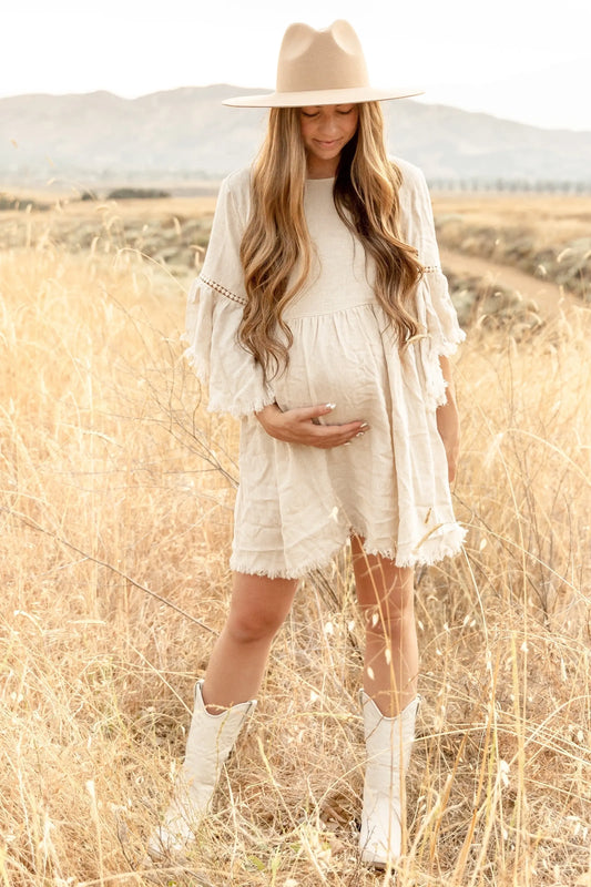 Beige Raw Edge Bell Sleeve Babydoll Maternity Dress with Crochet Trim and Back Keyhole Cutout PinkBlush