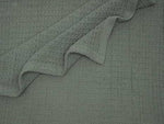 Crover 100% cotton waffle baby blanket for swaddling and stroller coverage.