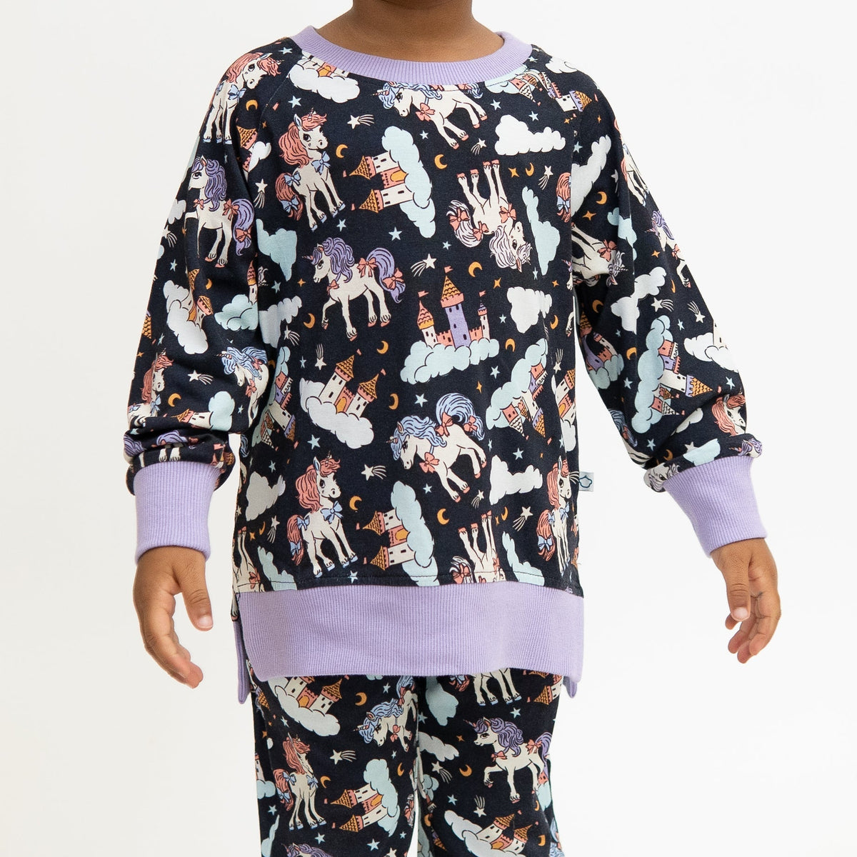 Toddler crew neck sweatshirt in a dark magical unicorn print.