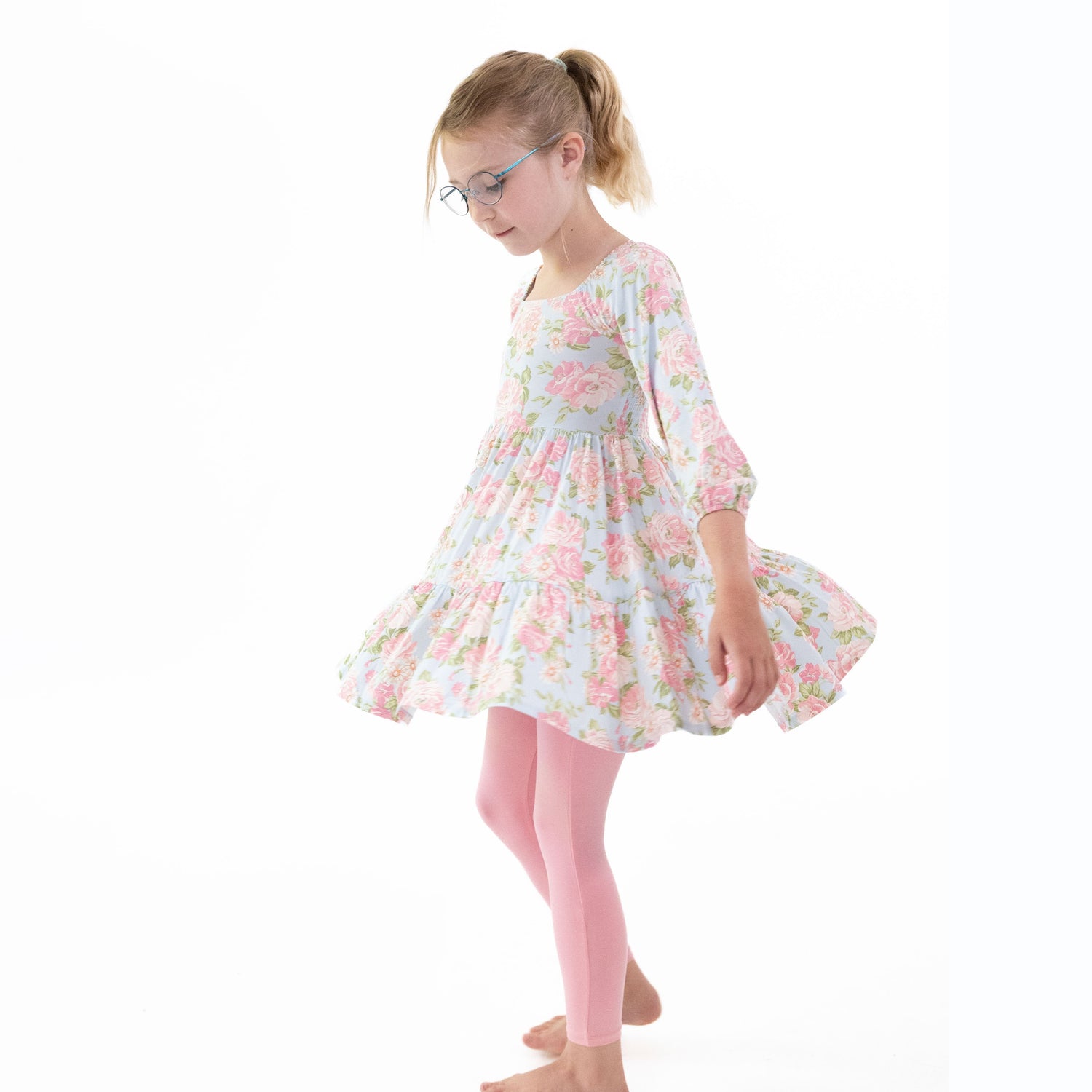 Floral cap sleeve dress with coordinating leggings, a two-piece outfit for a baby or toddler