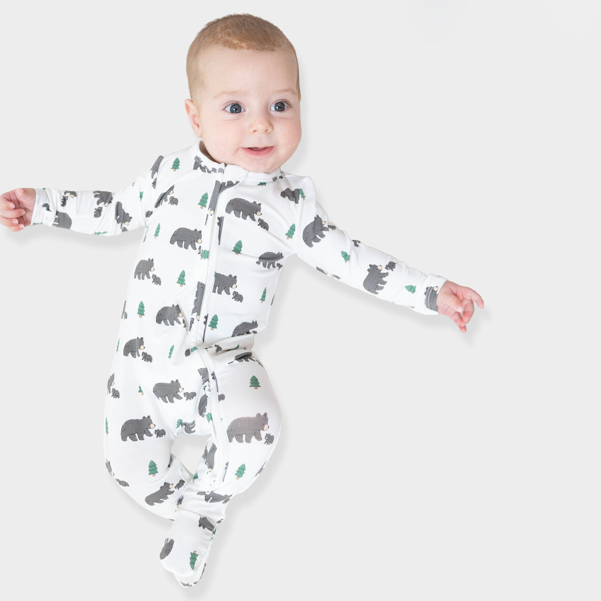 Baby footie pajamas in a black bear print with a full two-way front zipper and footed legs.