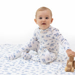 Footie pajamas in ribbed modal with a farm animals print, two-way zipper, footed legs, and grippers on the soles.