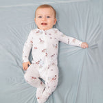 Baby footie pajamas with pointer dog and duck print, two-way zipper down the front, and footed grippers.