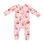 Baby footie pajama in a Bows and Santa print with two-way zipper and ruffle detail across the back