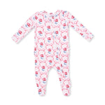 Baby footie pajamas in a Leslie rose print with two-way zipper and ruffle back detail