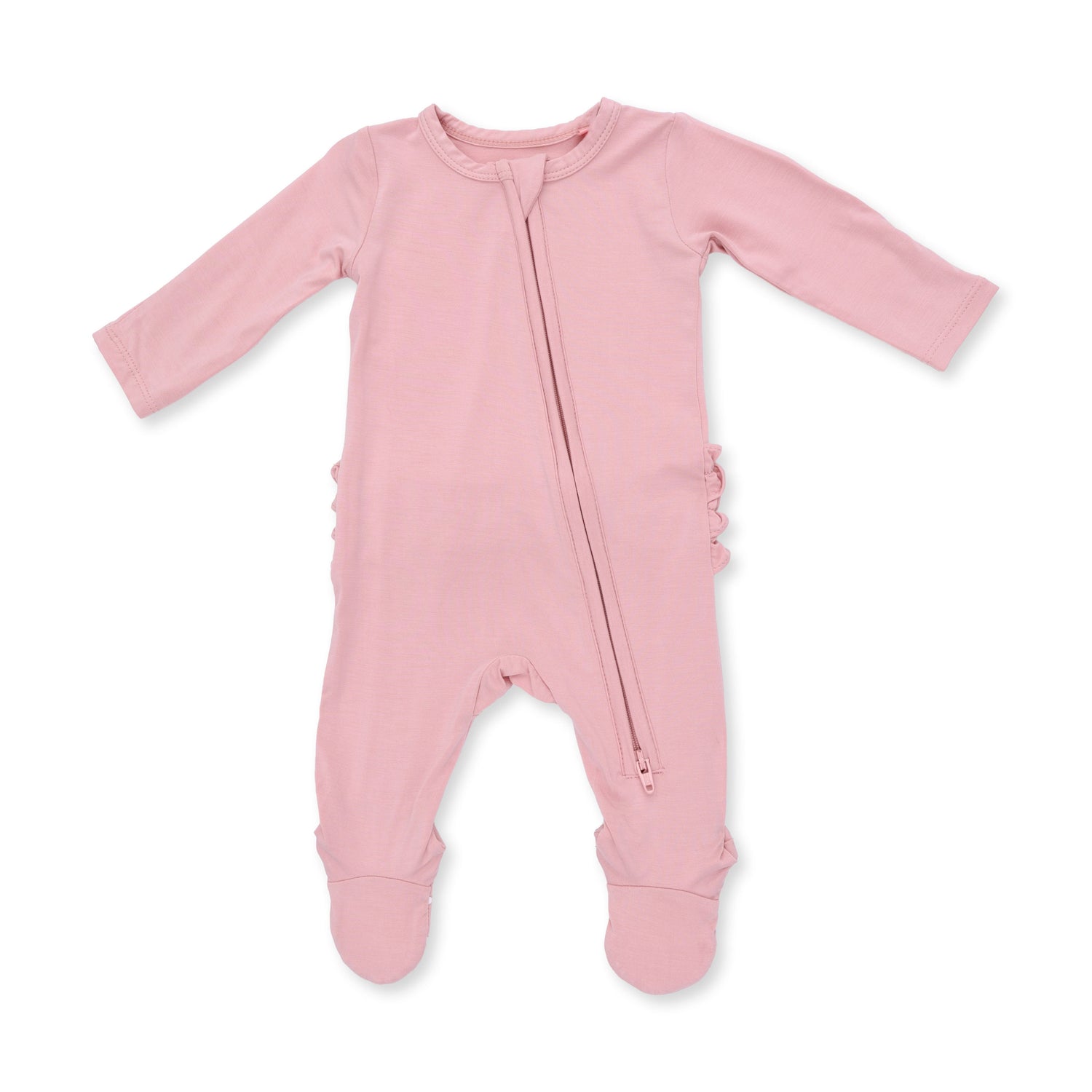Footie pajamas in solid mellow rose pink with a ruffle back detail and full-length front zipper.