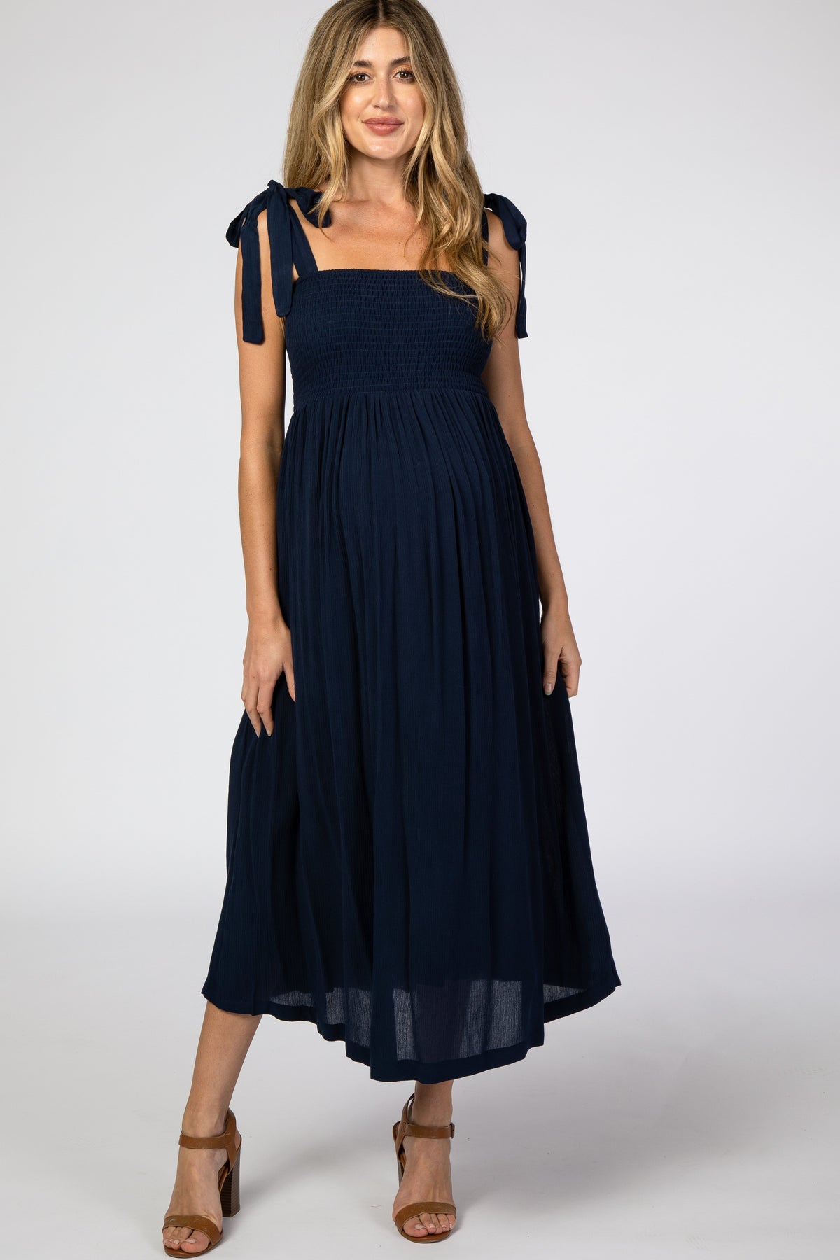Navy Blue Smocked Tie Strap Maternity Midi Dress by PinkBlush (view 1 of 9)