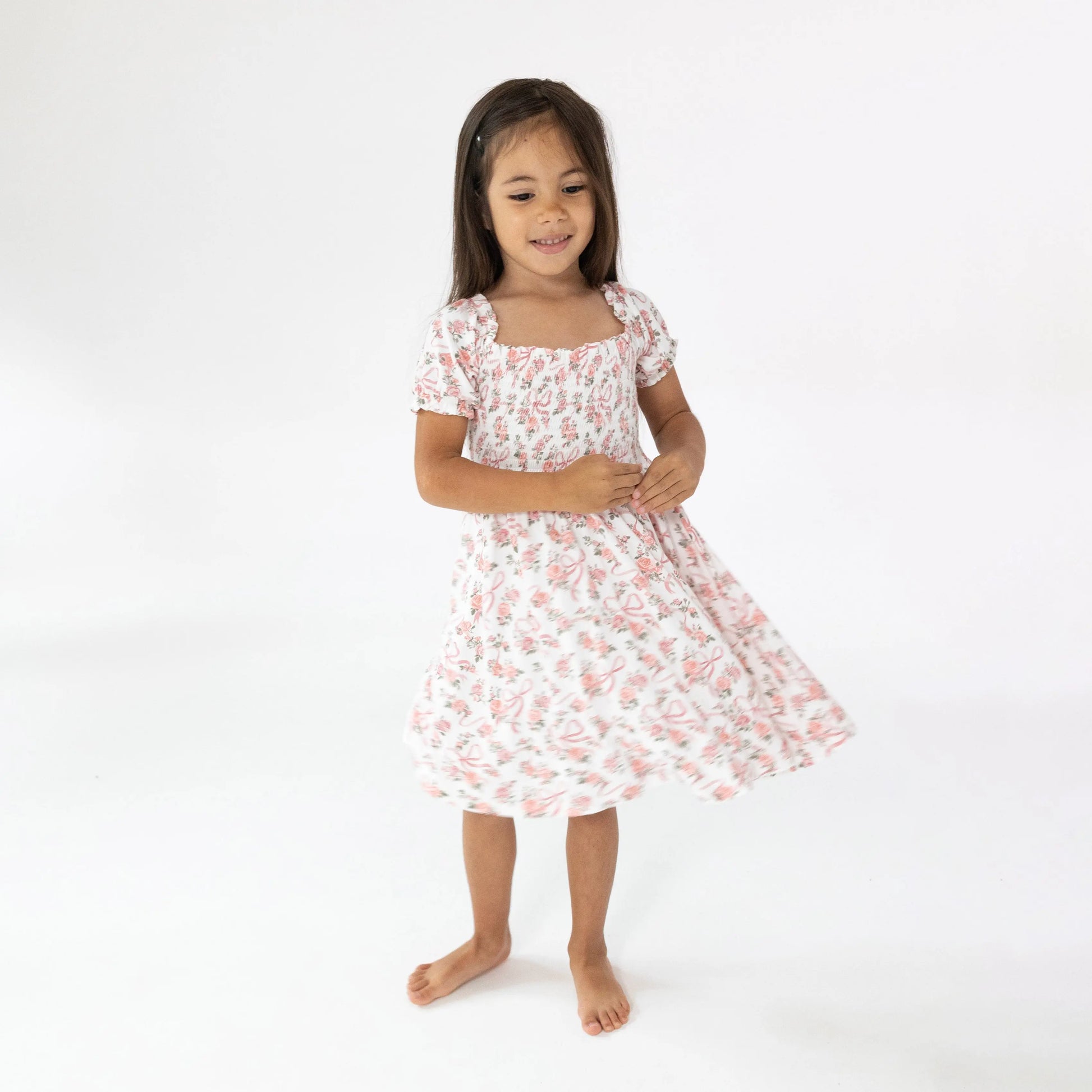 Puff Sleeve Smocked Dress And Diaper Cover Ribbons And Flowers.