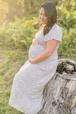 Ivory Floral Smocked Maternity Maxi Dress by PinkBlush (view 18 of 29)