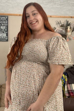 Ivory Floral Smocked Maternity Maxi Dress by PinkBlush (view 19 of 29)