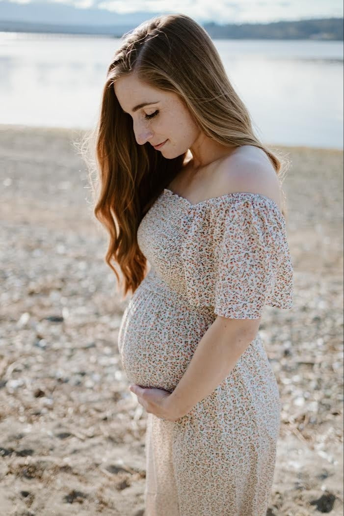 Ivory Floral Smocked Maternity Maxi Dress by PinkBlush (view 20 of 29)