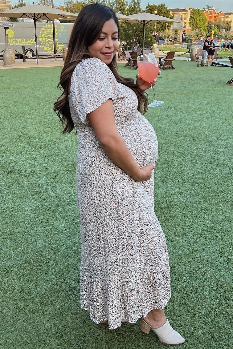 Ivory Floral Smocked Maternity Maxi Dress by PinkBlush (view 24 of 29)
