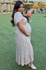 Ivory Floral Smocked Maternity Maxi Dress by PinkBlush (view 24 of 29)