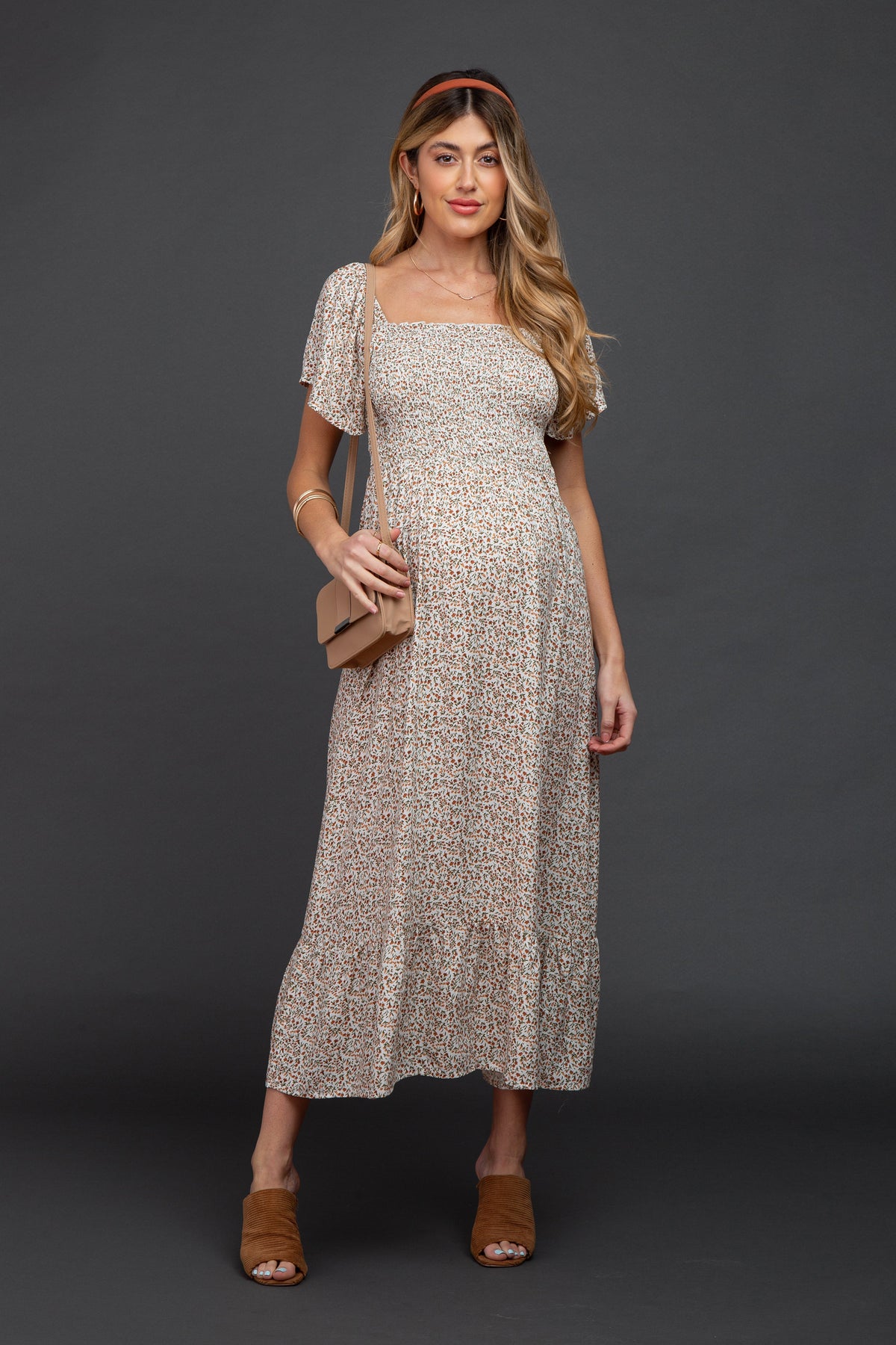 Ivory Floral Smocked Maternity Maxi Dress by PinkBlush (view 3 of 29)