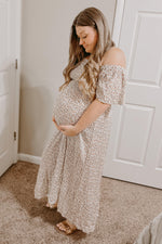 Ivory Floral Smocked Maternity Maxi Dress by PinkBlush (view 28 of 29)