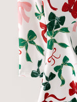 Girls Christmas Bow Print Dress by Rylee Faith Designs