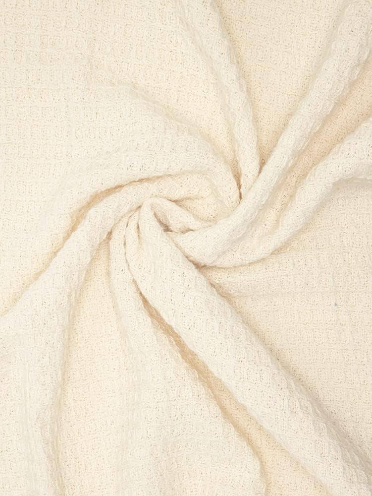 Crover 100% cotton waffle baby blanket for swaddling and stroller coverage.