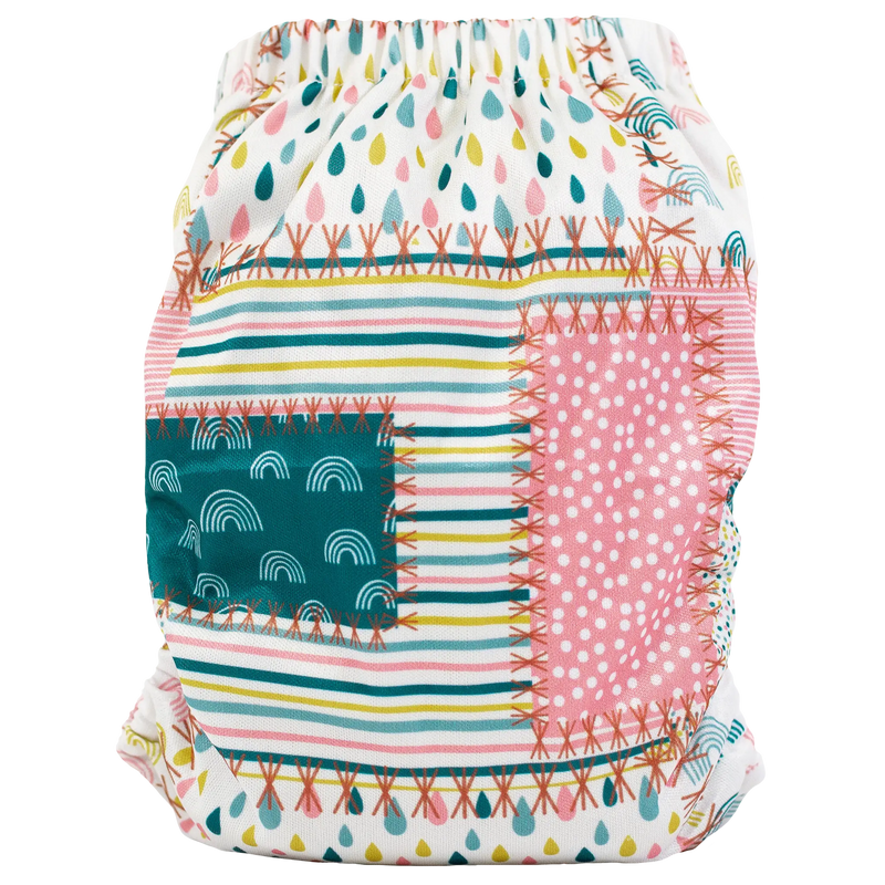 Slim Fit AIO Cloth Diaper with colorful patchwork design for babies 8-40lbs.