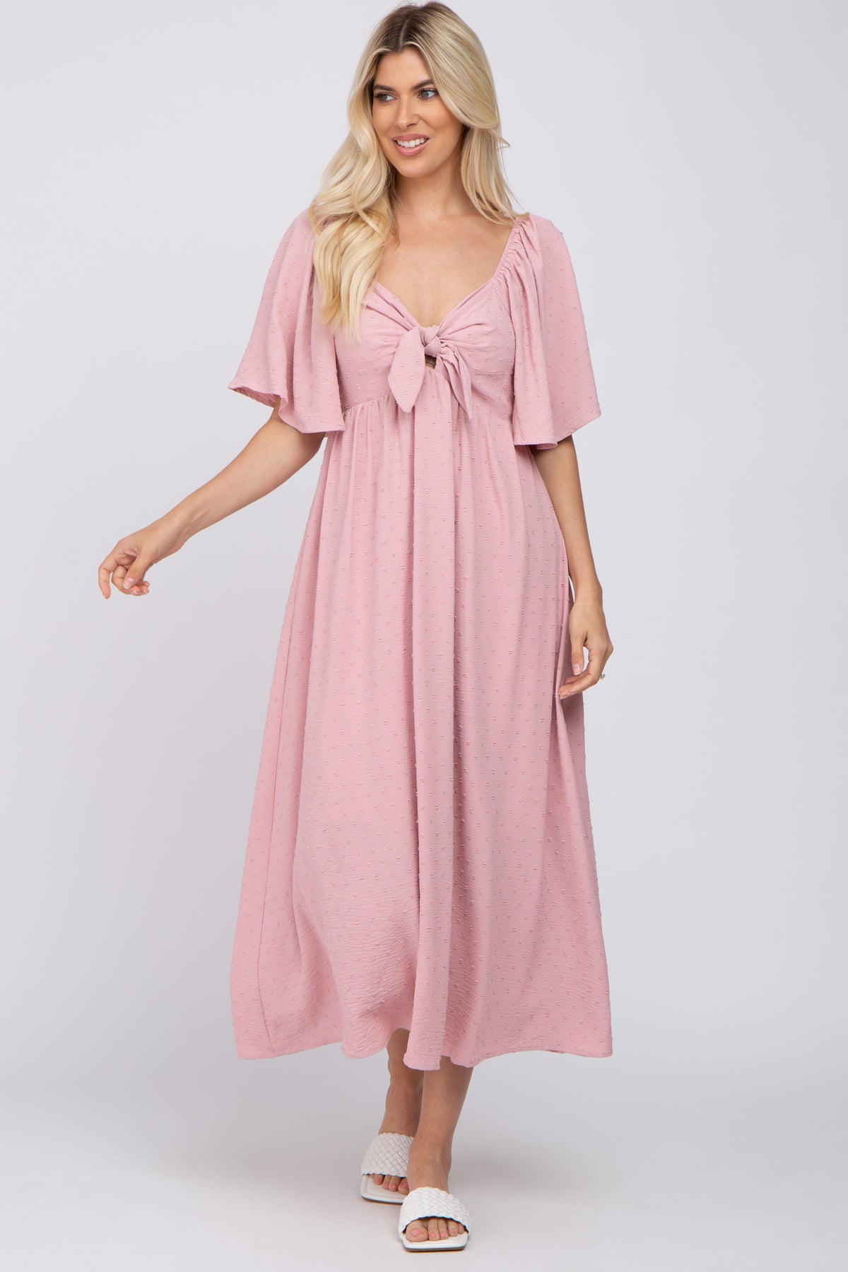 Mauve textured dot midi dress with v-neckline, front tie, front cutout and short ruffle sleeves