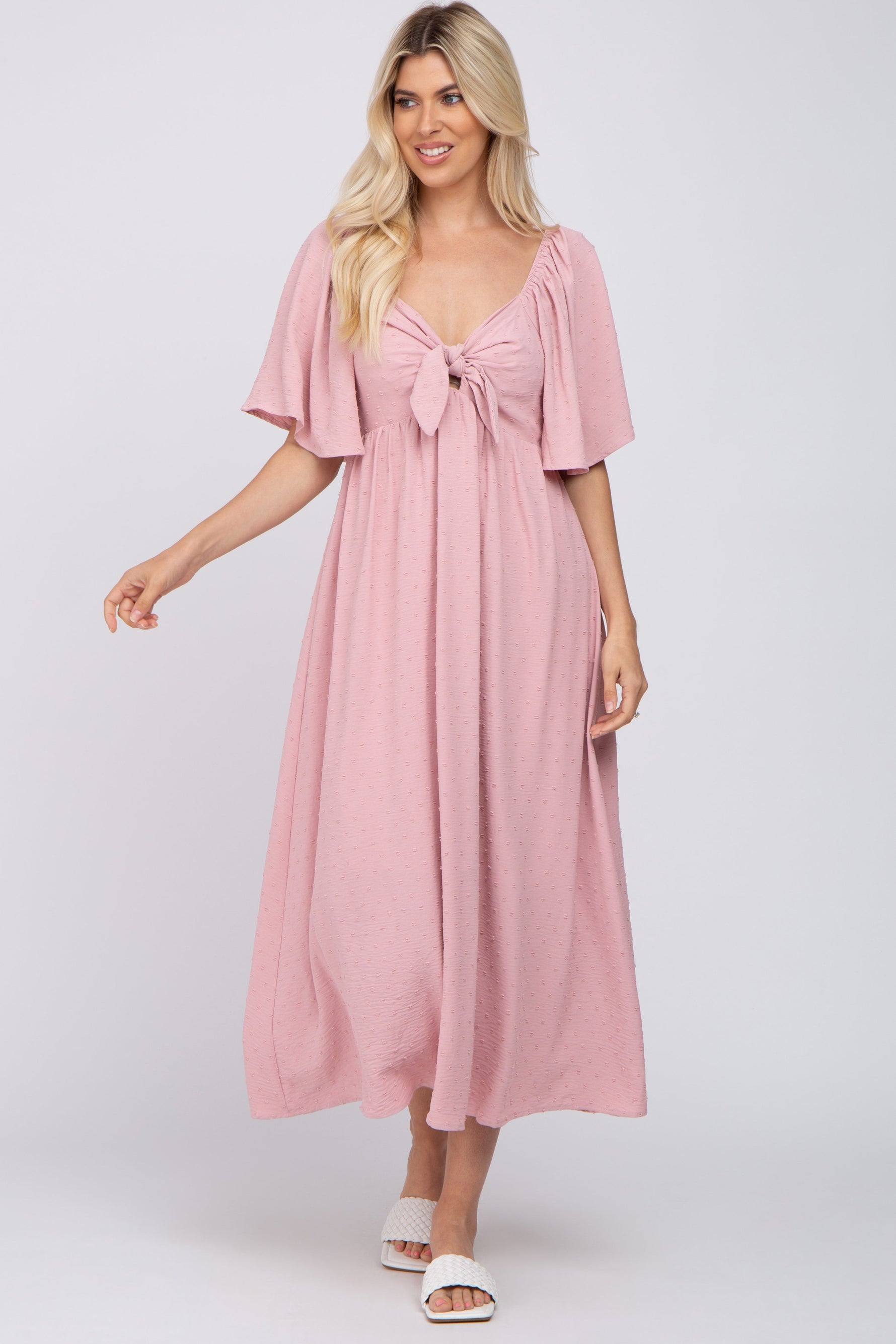 Mauve textured dot midi dress with v-neckline, front tie, front cutout and short ruffle sleeves