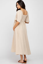 Textured Dot Front Tie Ruffle Sleeve Maternity Dress by PinkBlush (view 3 of 8)