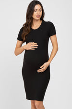Black ribbed fitted maternity dress with short sleeves and a round neckline