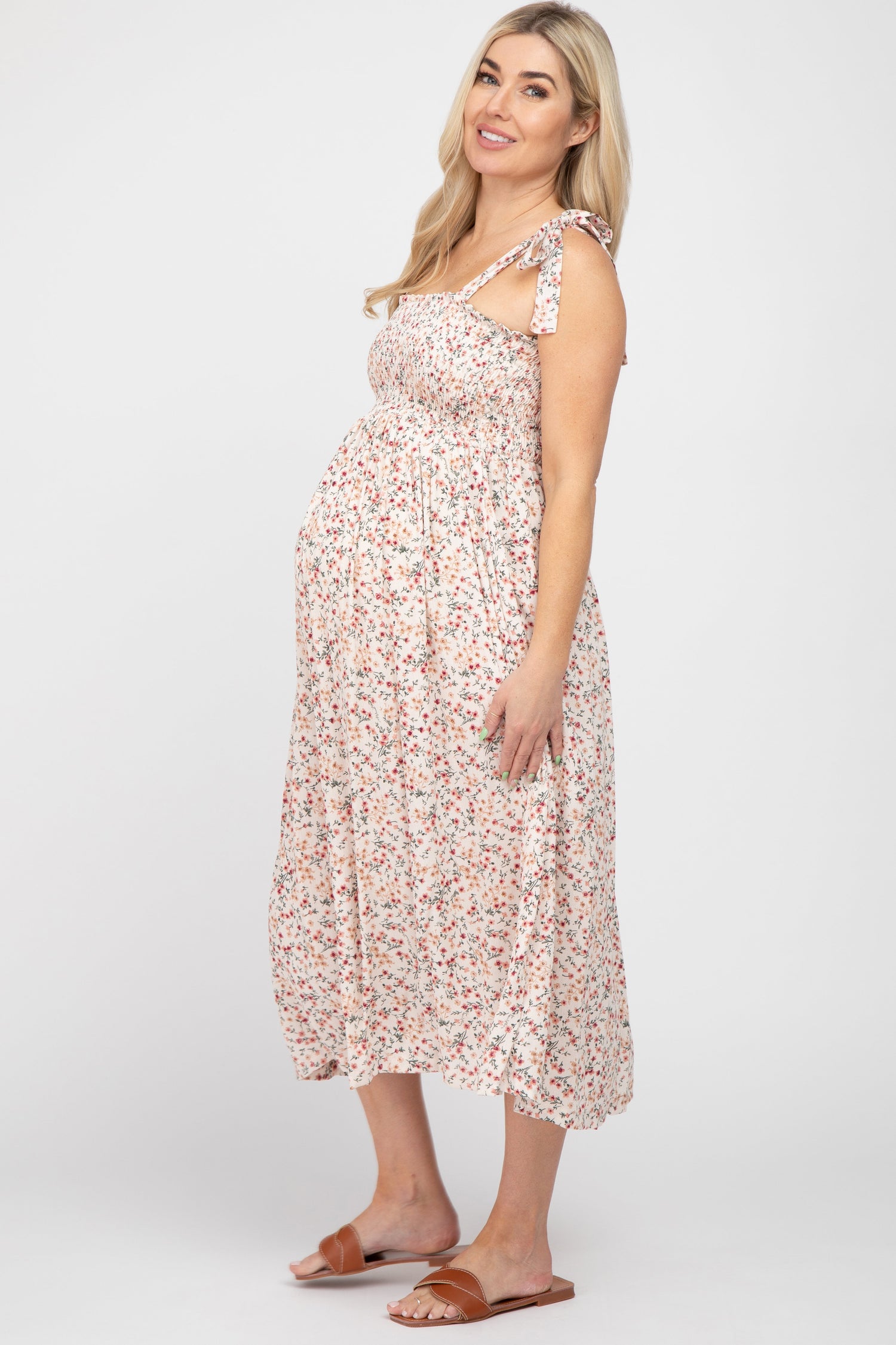 Cream floral maternity midi dress with self-tie straps, smocked top, and square neckline