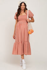 Rust Gingham Smocked Maternity Midi Dress by PinkBlush