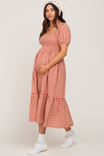 Rust Gingham Smocked Maternity Midi Dress by PinkBlush