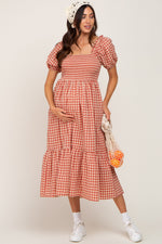 Rust Gingham Smocked Maternity Midi Dress by PinkBlush