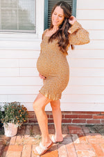 Ditsy floral maternity mini dress with squared neckline, smocked body, long cinched sleeves and gathered hem