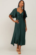 Hunter green midi dress with v-neck, front tie, cutout, ruffle sleeves and A-line skirt.