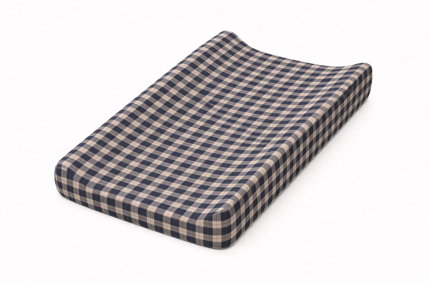 Blue plaid changing pad cover with elastic edges fitted over a contoured changing pad