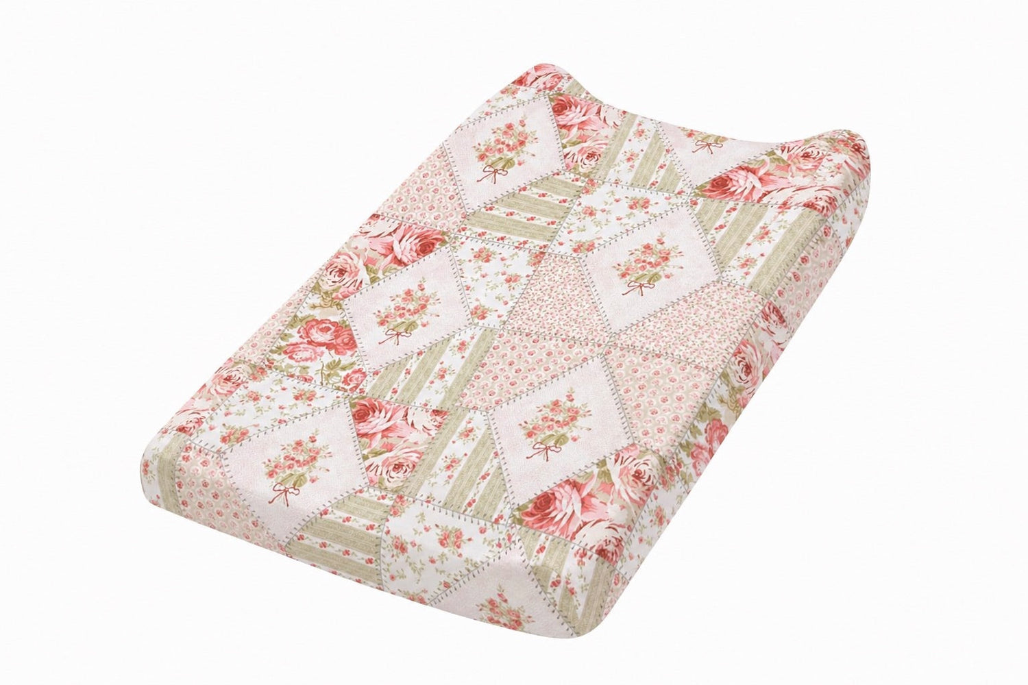 Changing pad cover in pink and white patchwork pattern fitted over a contoured changing pad