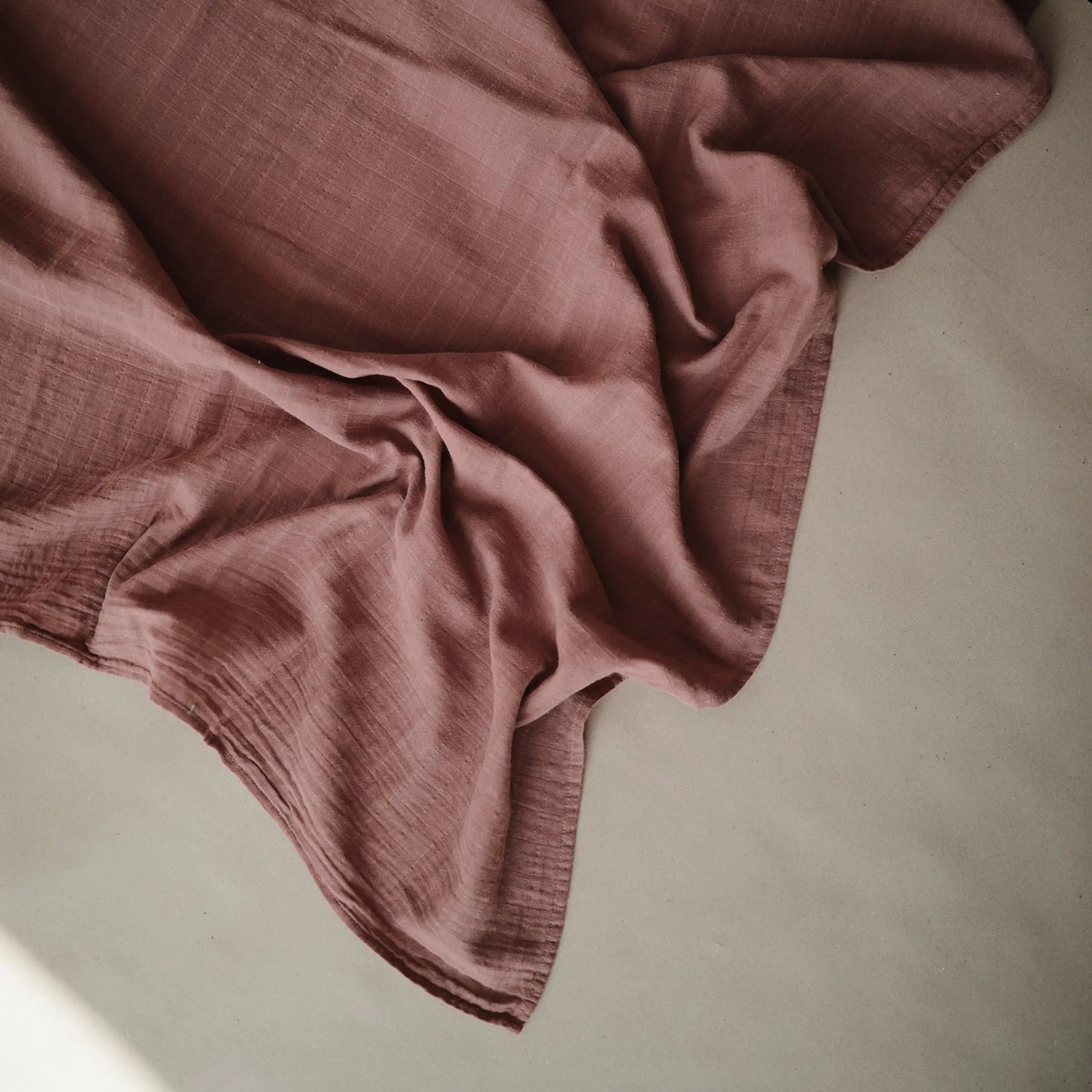 Organic Cotton Muslin Swaddle Blanket for Baby Cuddling and Nursing Mushie