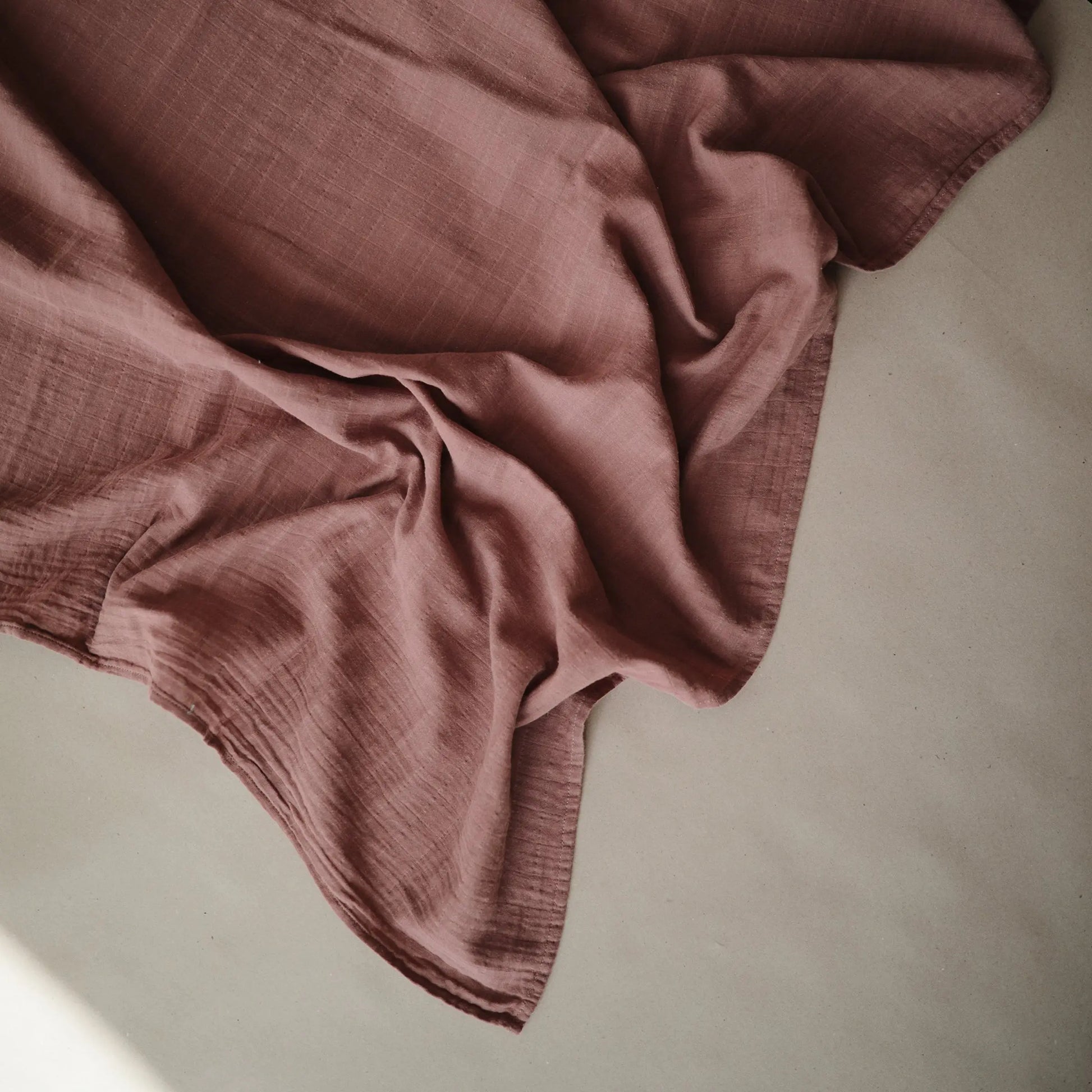 Organic Cotton Muslin Swaddle Blanket for Baby Cuddling and Nursing Mushie