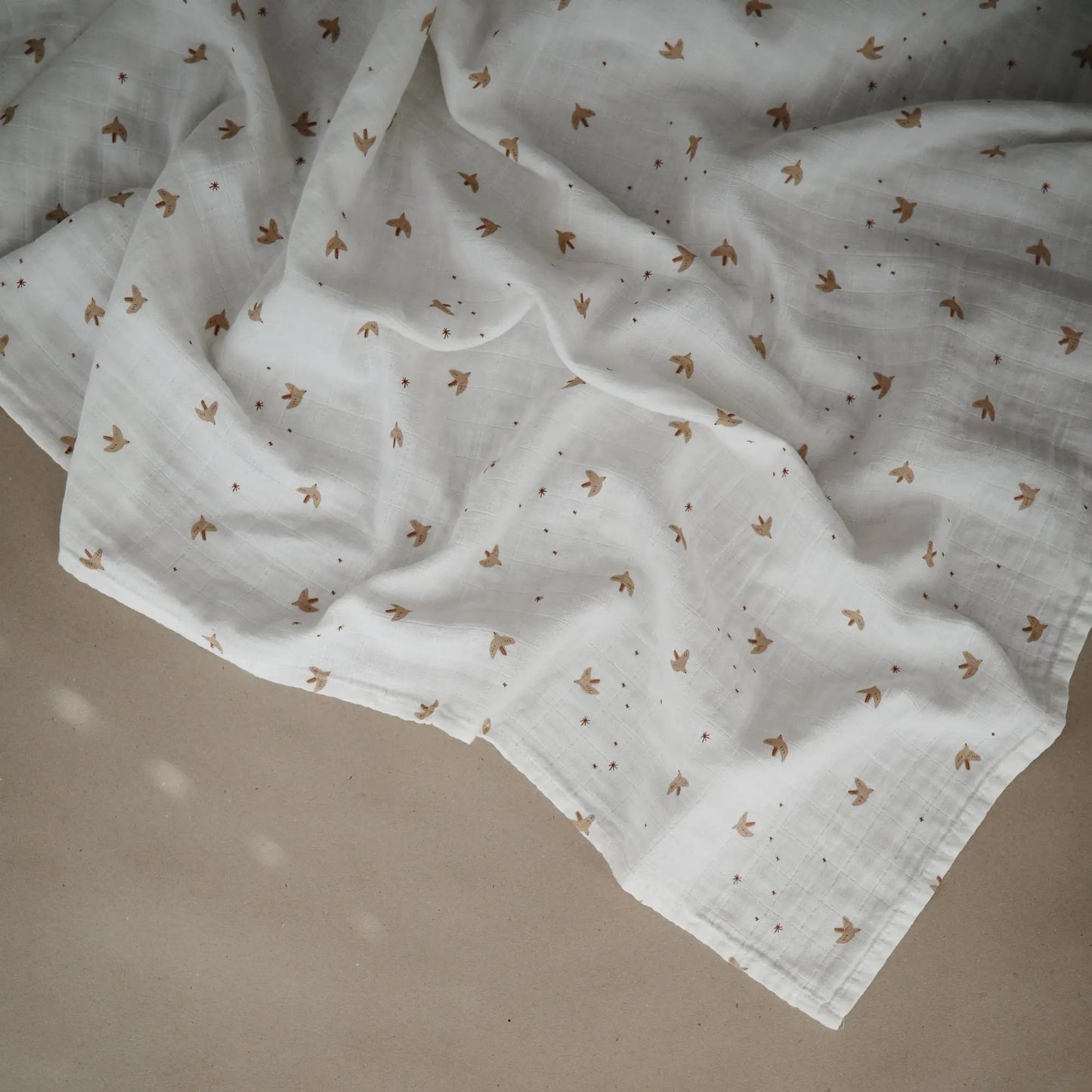 Organic Cotton Muslin Swaddle Blanket for Baby Cuddling and Nursing Mushie