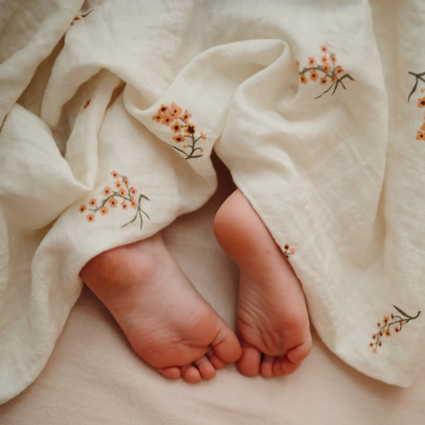 Organic Cotton Muslin Swaddle Blanket for Baby Cuddling and Nursing Mushie