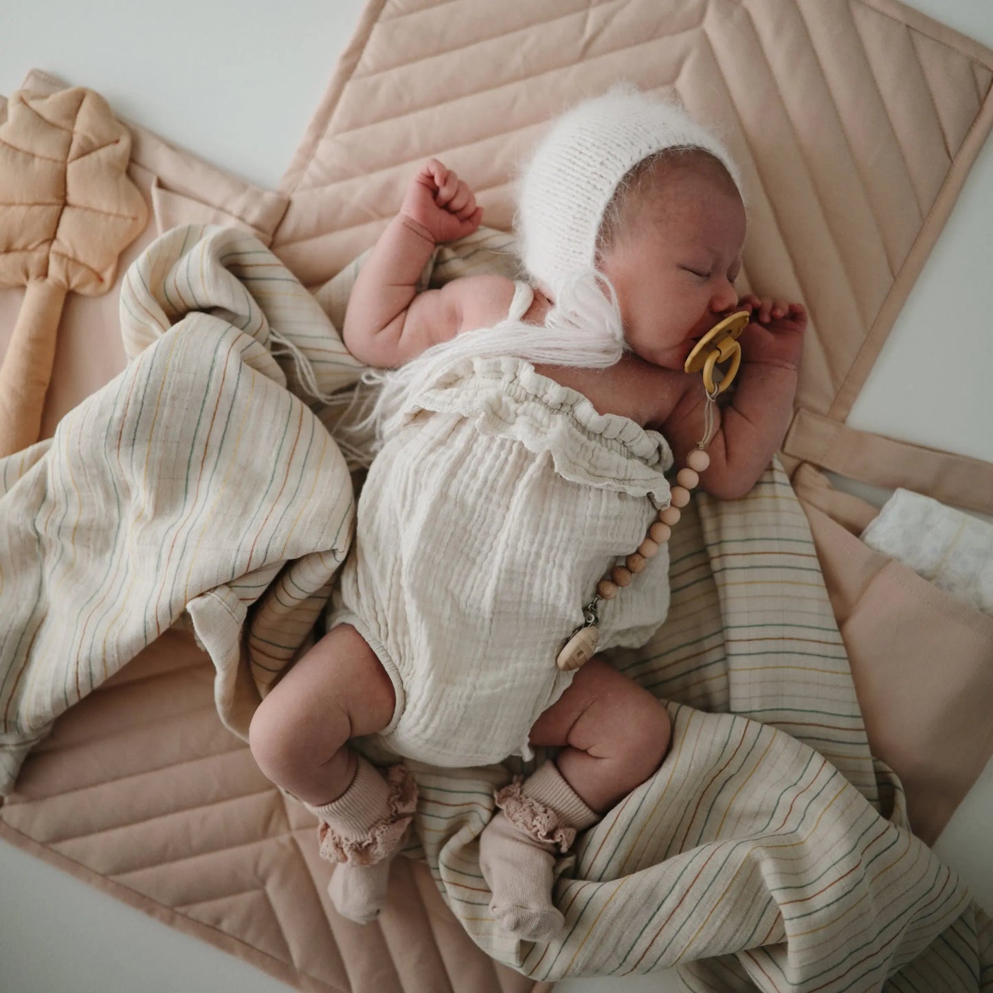 Organic Cotton Muslin Swaddle Blanket for Baby Cuddling and Nursing Mushie