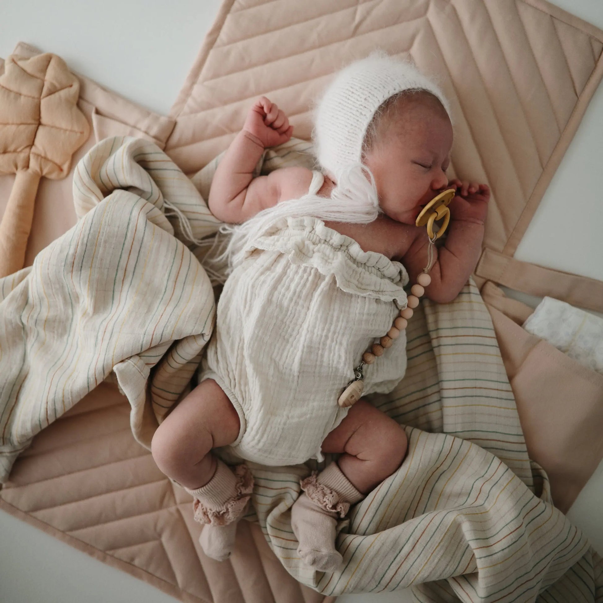 Organic Cotton Muslin Swaddle Blanket for Baby Cuddling and Nursing Mushie