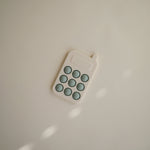 Silicone Phone Press Toy by Mushie