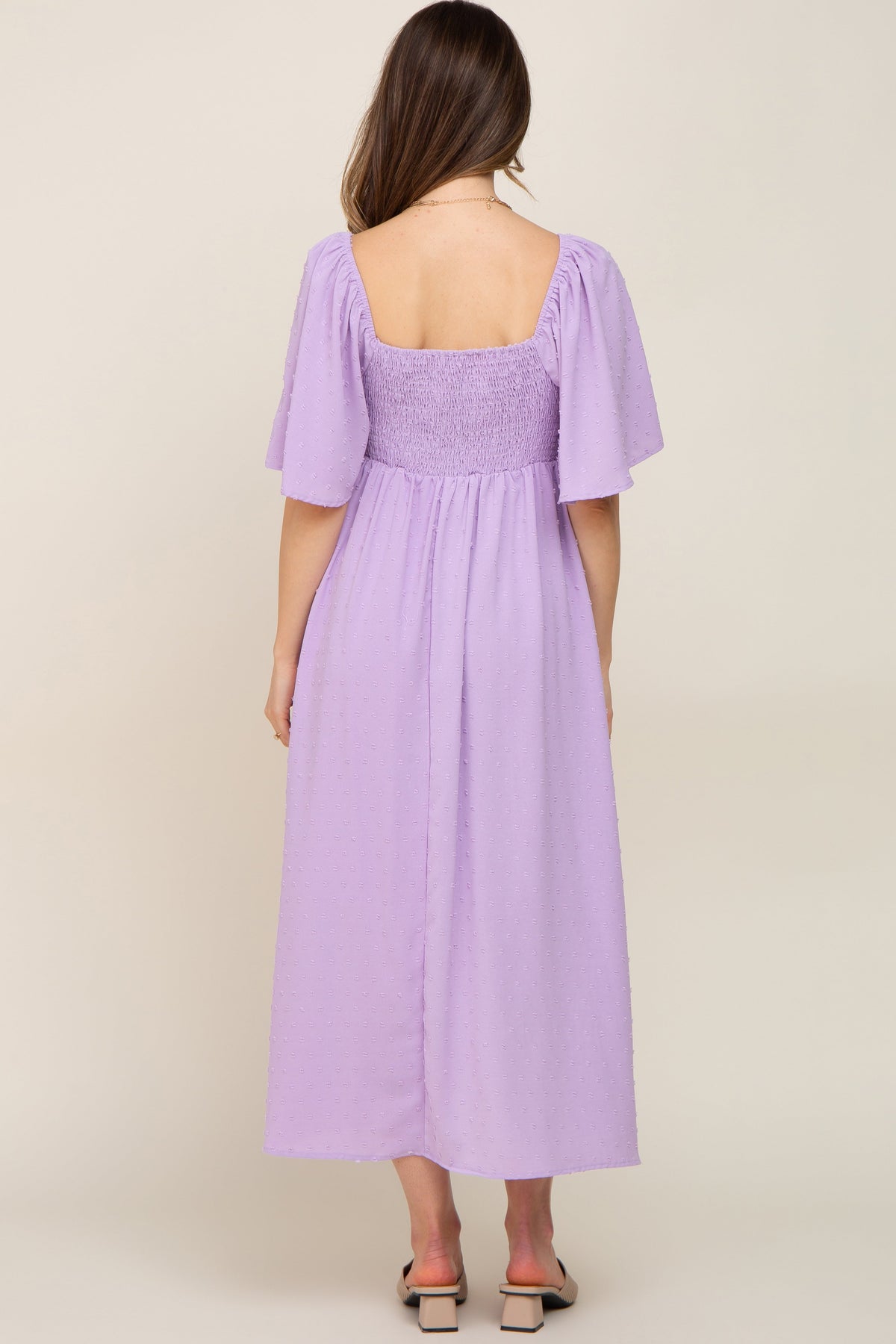 PinkBlush Lavender Textured Dot Front Tie Ruffle Sleeve Maternity Midi Dress on a model.